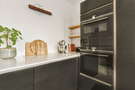 Moderne Wanduhr für die Küche aus Nussbaum, geräuschloses Uhrwerk,